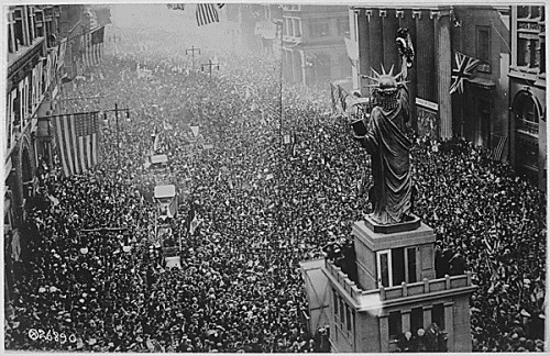 The announcing of the armistice on November 11, 1918, was the occasion for a monster celebration in Philadelphia, Pennsylvania. Thousands massed on all sides of the replica of the Statue of Liberty on Broad Street, and cheered unceasingly. Philadelphia Public Ledger. (National Archives)